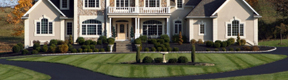 residential services: landscaped home with cut lawn